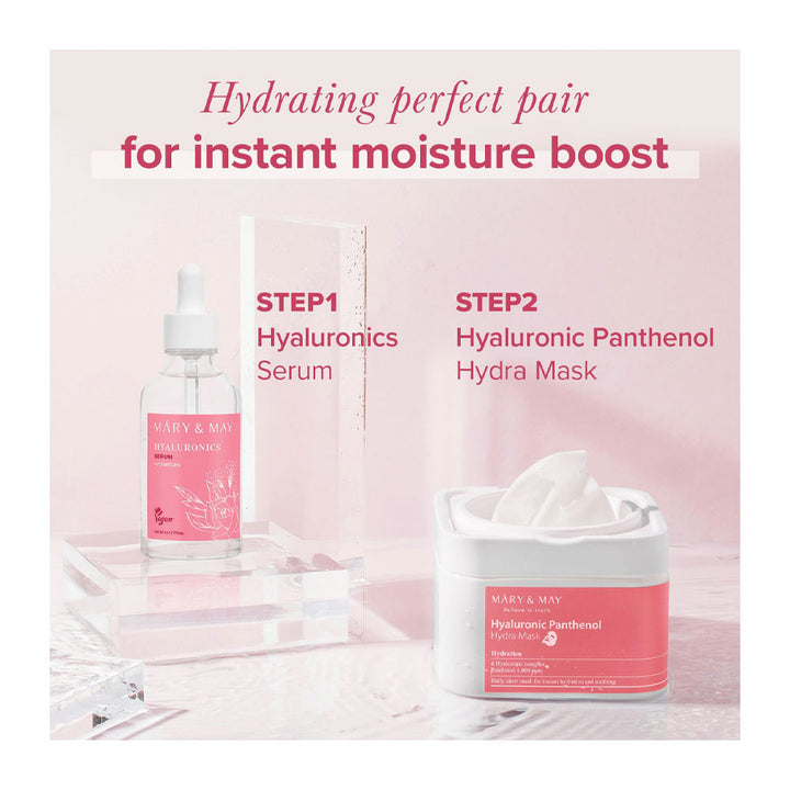 Skincare product set with serum and mask on a pink background