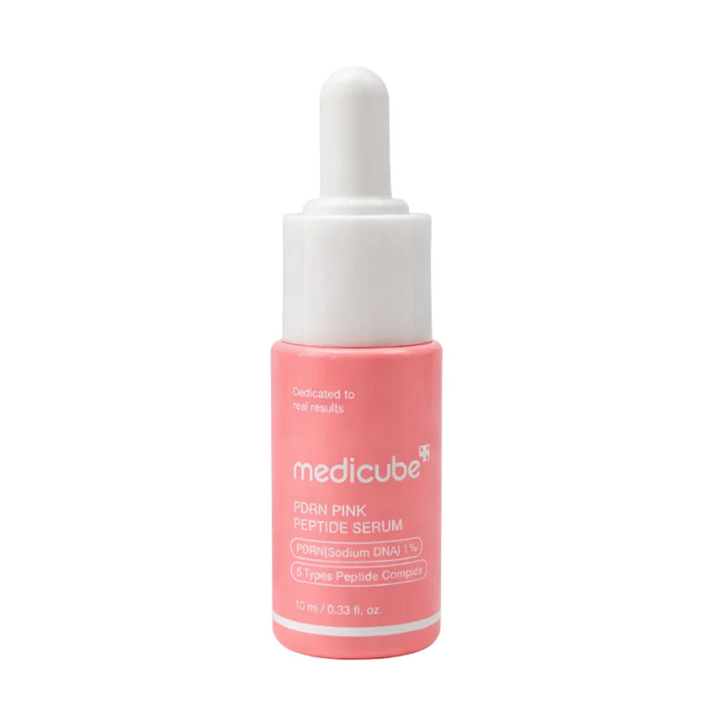 Medicube Porn Pink Peptide Serum in a 15 ml dropper bottle with a pink label and white cap, set against a plain white background.