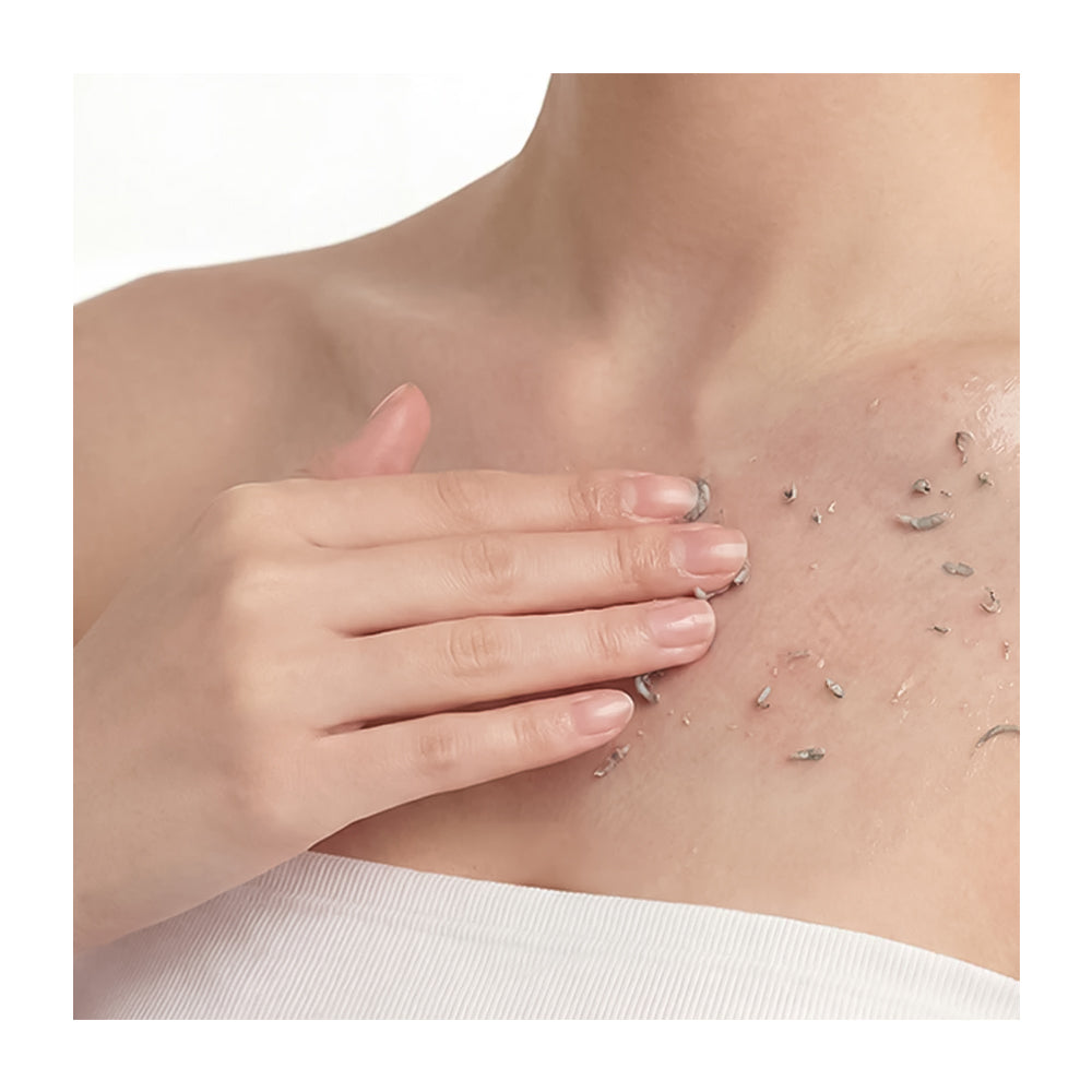 Hand touching skin with visible hair and pores on a white background