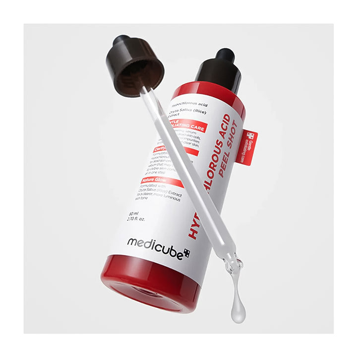 Medicube Alcoholic Acid Peel Shot with applicator on a white background