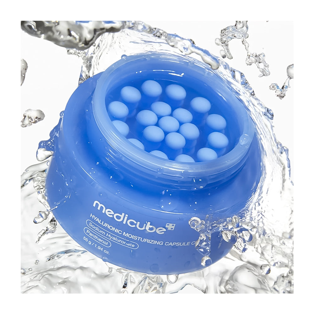 Blue jar of Medicube hyaluronic moisturizing capsules with water splash background