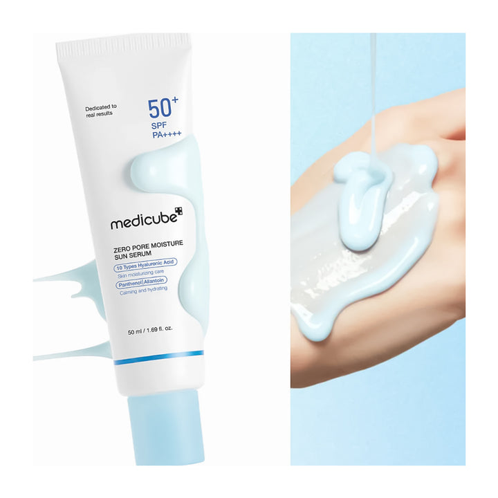 Medicube sunscreen serum tube with application on skin on a light blue background