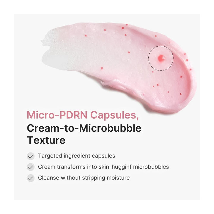 A cosmetic texture swatch of pale pink cream with small red capsule-like dots, shown above marketing text that reads &