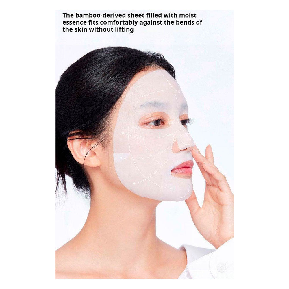 A woman wearing a translucent sheet mask on her face, touching her cheek, with text at the top describing the bamboo-derived sheet and moist essence.