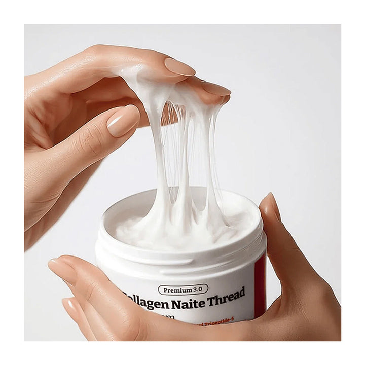 Collagen Naite Thread product being stretched by a hand against a white background