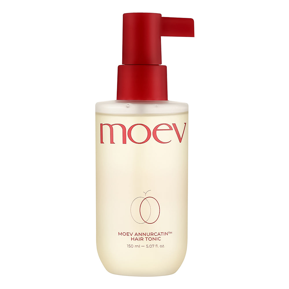 Moev Annurcatin Hair Tonic in a frosted bottle with a red pump dispenser, shown on a solid white background.