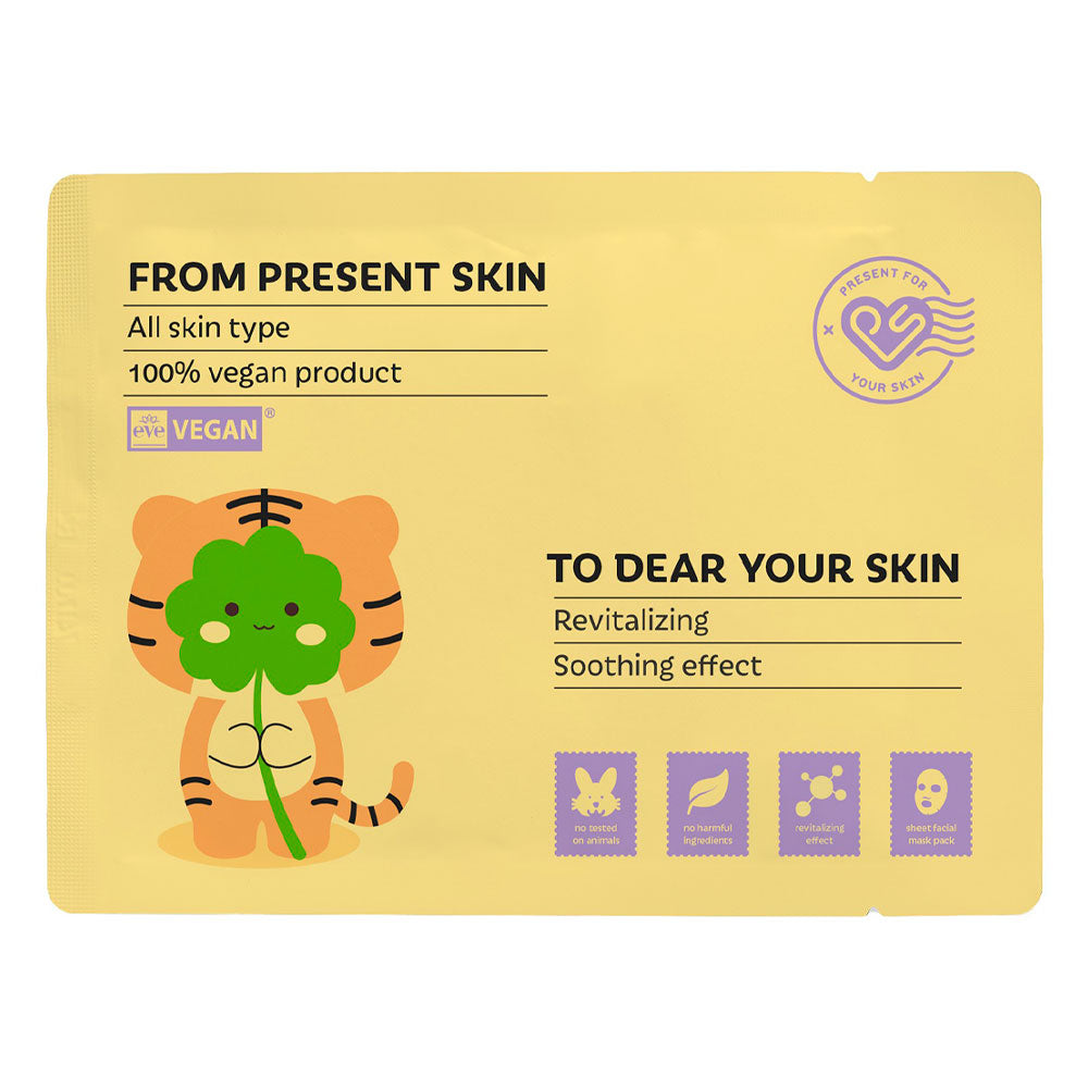 A flat yellow skincare packet or card with printed text reading 'FROM PRESENT SKIN' and 'TO DEAR YOUR SKIN,' plus a cartoon tiger holding a green leaf. The package also includes a circular 'Parental Fun' seal and small purple icon panels near the bottom.