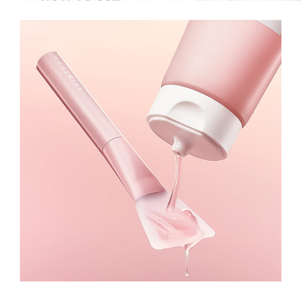 Pink skincare device dispensing a gel onto a white pad against a pink background