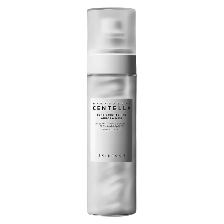 SKIN1004 Madagascar Centella Tone Brightening Aurore Mist in a frosted cylindrical pump bottle, shown on a solid white background.