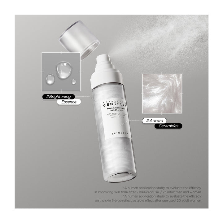 A clear cylindrical cosmetic bottle labeled &