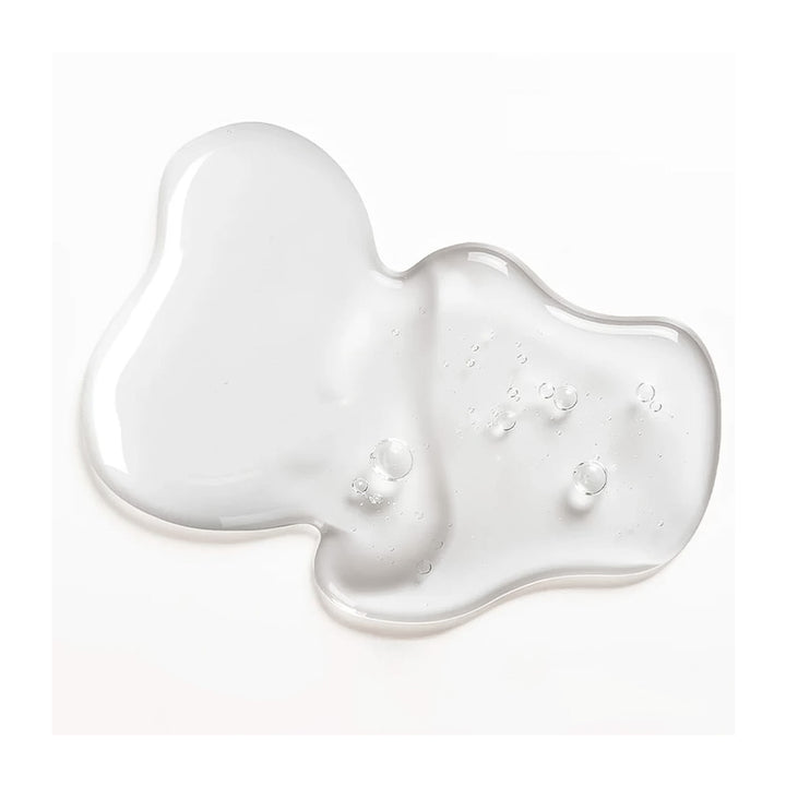 White gel or cream with bubbles on a white background