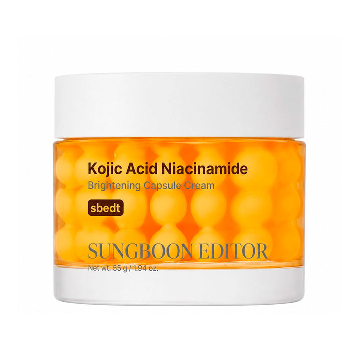 A jar of Sungboon Editor Kojic Acid Niacinamide Brightening Capsule Cream, featuring orange capsules visible through a clear container with a white lid and base.