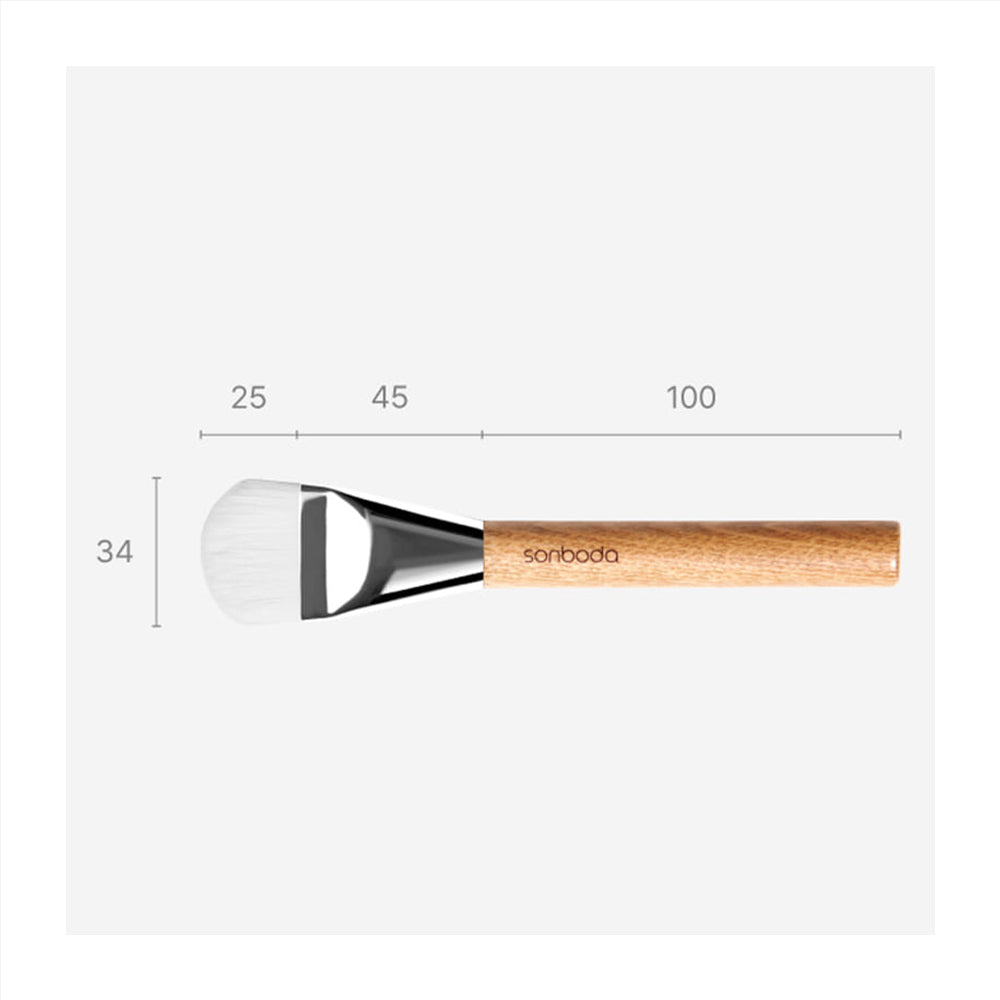A makeup brush with a light wood handle, black ferrule, and white bristles, shown on a light gray background with dimension labels indicating 25, 45, 100, and 34.