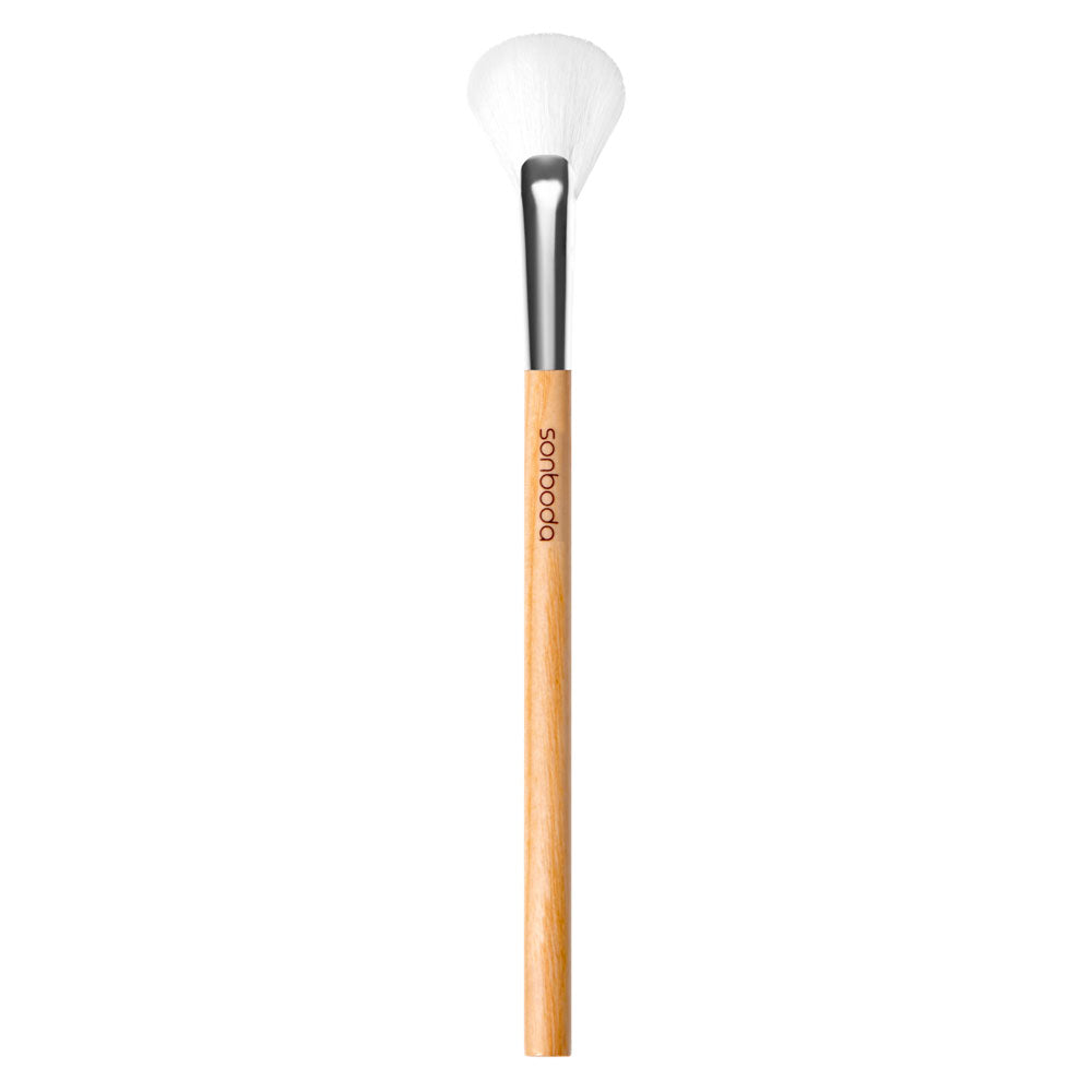 A single makeup brush with a light natural wood handle, a black ferrule, and white bristles, shown vertically against a plain white background. The brand name 'soopos' is printed on the handle.