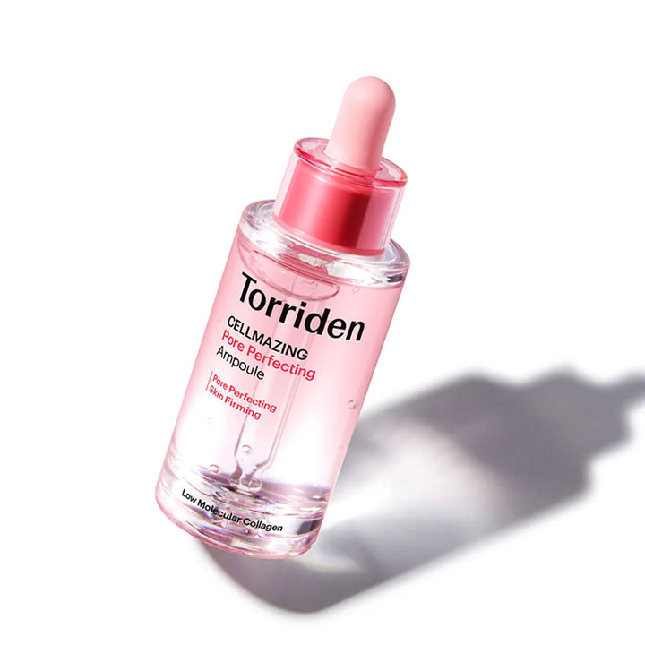 A bottle of Torriden Cellmaxing Care Perfecting Ampoule liquid treatment with a pink dropper cap, shown on a white background with a soft shadow.