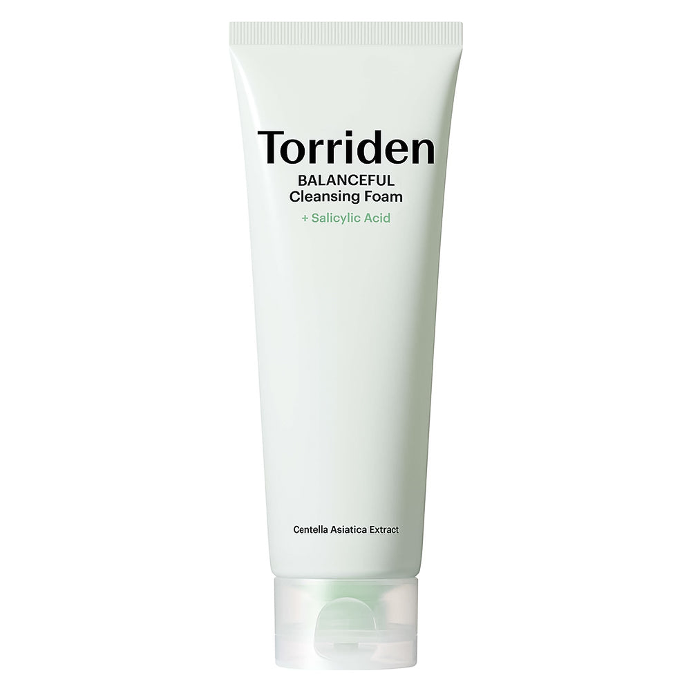 A white squeeze tube of Torriden Balanceful Cleansing Foam with Salicylic Acid, featuring black and green text, on a solid white background.