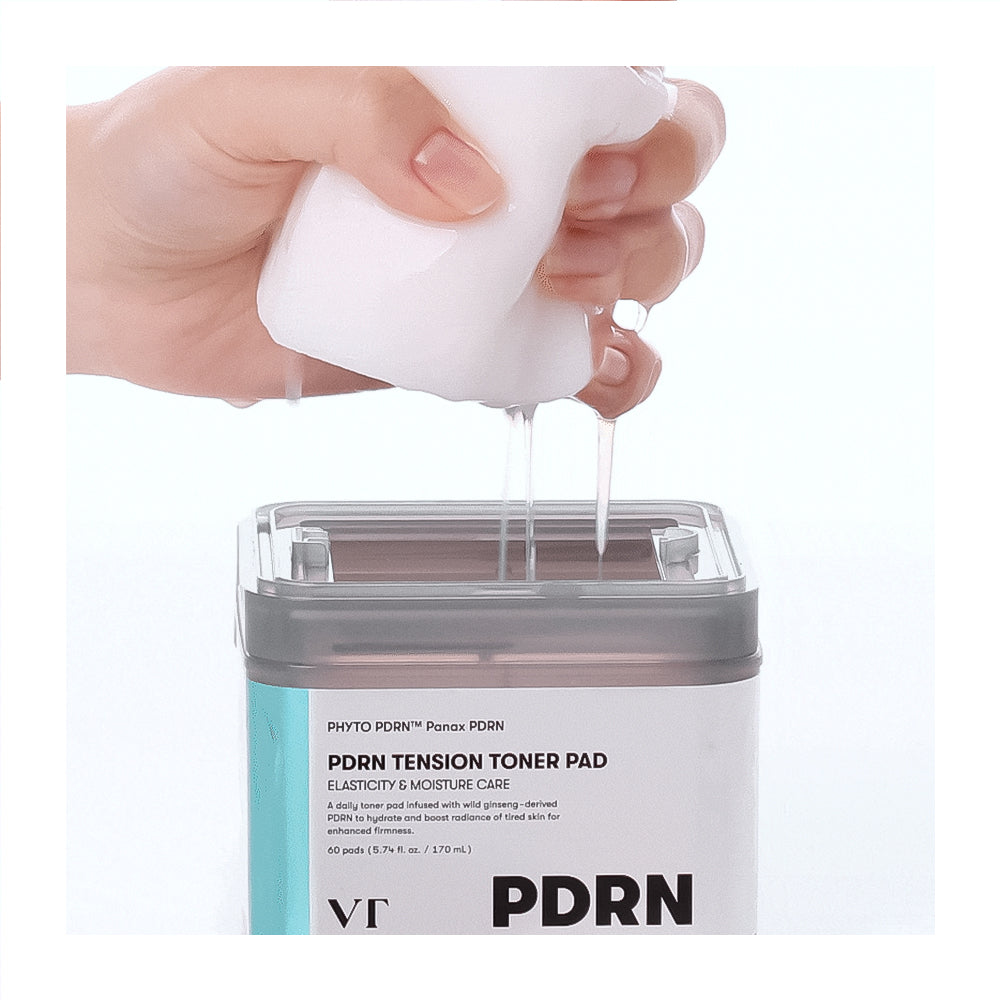 Hand dispensing a white liquid into a container labeled &