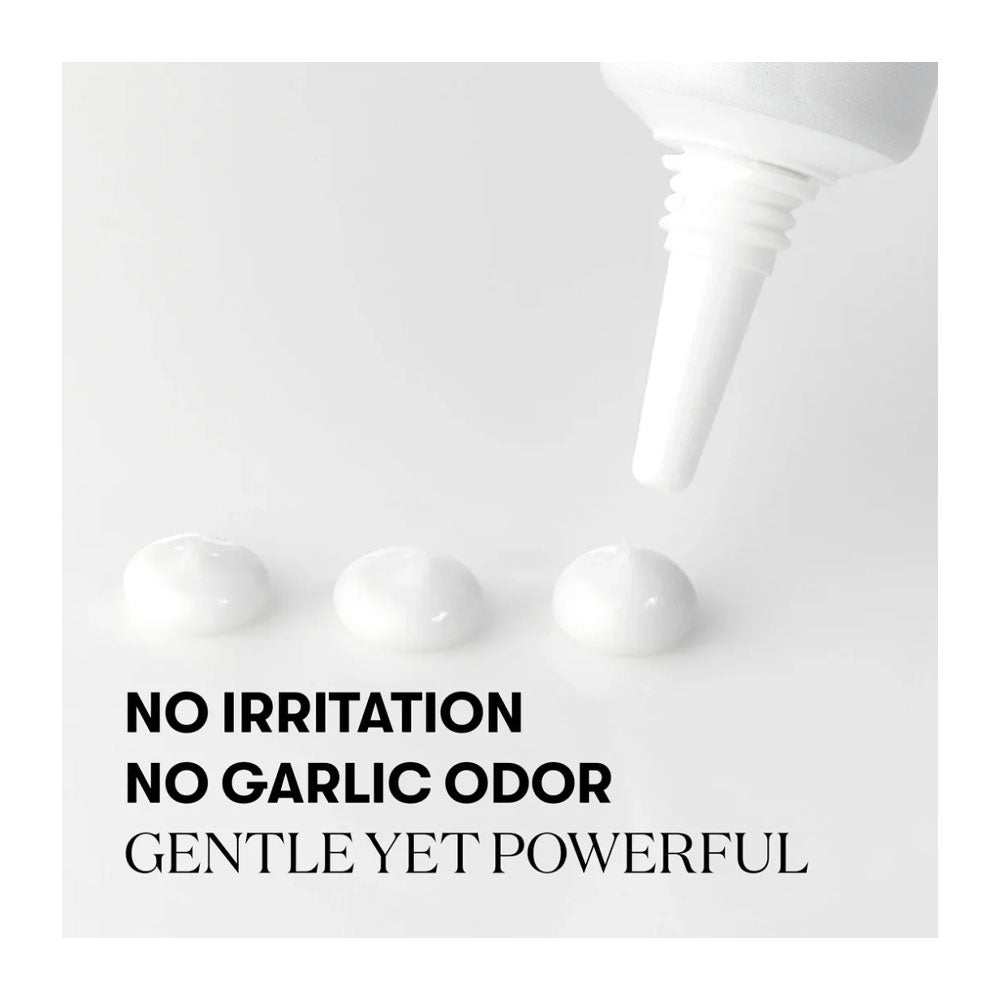A white squeeze tube dispensing three small dollops of white cream on a light gray background, with bold black text reading 'NO IRRITATION NO GARLIC ODOR GENTLE YET POWERFUL'.